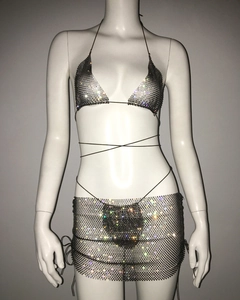 Detailed view of silver rhinestone fishnet bikini set with glitter mesh and tie-up design