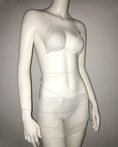 Detail of rhinestone mesh bikini set with halter wrap top and mini skirt on mannequin