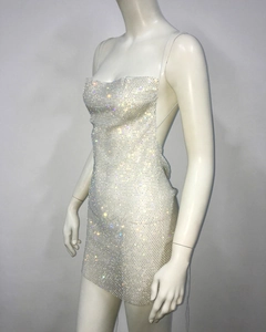 Detailed view of the sparkling crystal rhinestones and sleek fit of the mini bodycon dress