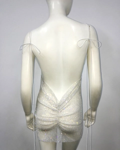 Detail of rhinestone backless dress showing silver crystals and adjustable halter ties