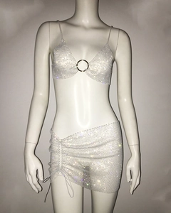 Detail of rhinestone mesh set showing gold ring connector and side drawstring skirt