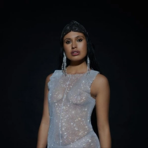 Detailed view of silver mesh rhinestone stretch cap with sparkling crystal embellishments