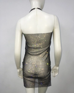 Macro view of back detail on stretchy mesh bodycon dress with sparkling rhinestones