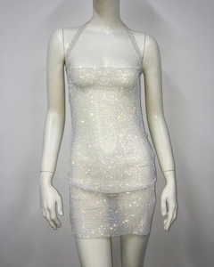 Detailed macro view of the sparkling rhinestone fishnet fabric on this sexy halter two-piece set