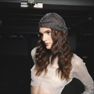 Sparkly black rhinestone turban hat and matching mesh top for festive party wear