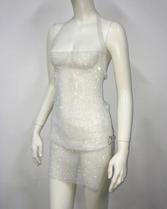 Macro view of silver rhinestone mesh party set with halter neck top and side ring skirt