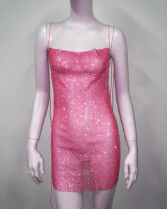 Close-up of pink rhinestone mesh on backless mini dress with thin shoulder straps