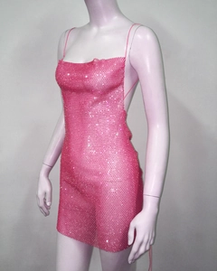 Detail of rose pink rhinestone mesh dress featuring side backless cut and thin straps