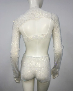 Detailed back view of rhinestone studded long sleeve mesh top and high waist shorts set