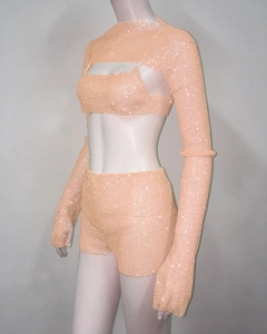Detail of apricot rhinestone three-piece set with shimmering sequin mesh and cropped top