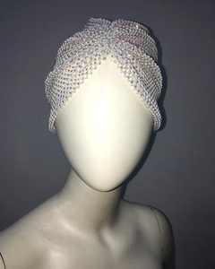 Detail of beaded headband with iridescent pearls in a twisted turban style design