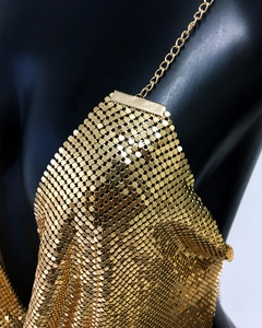 Detail shot of golden metal sequin chain top with delicate aluminum mesh link structure