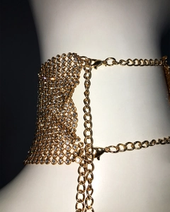 Detail of gold metal mesh top with sparkling white rhinestones and adjustable lobster clasp