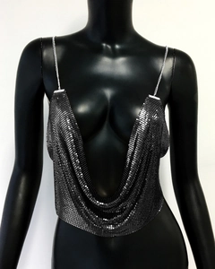 Detailed view of dark grey metallic sequin camisole with plunging cowl neck and metal chains