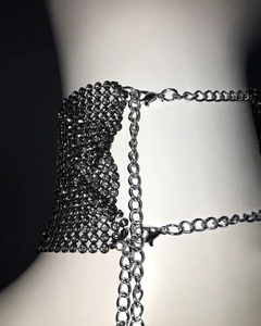 Close-up of silver metal mesh choker with rhinestones and adjustable lobster clasp