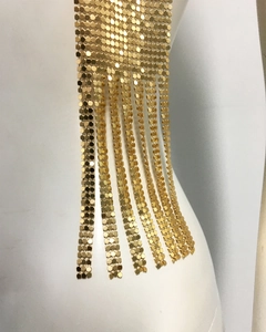 Close-up of golden metal sequin mesh scarf showing fine octagonal link details