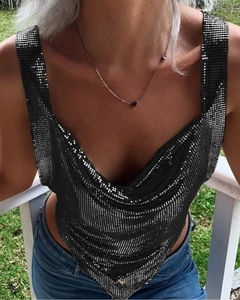 Detail of black sequin metal mesh crop top showing shimmering texture and web structure