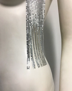 Detail view of silver metal sequin scarf with fringe, featuring shiny mesh link texture