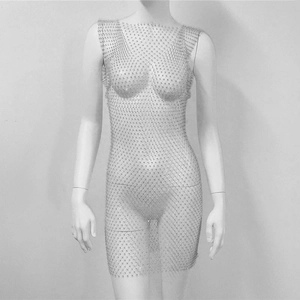 Close-up of mesh dress with sparkling rhinestones and delicate silver grid pattern