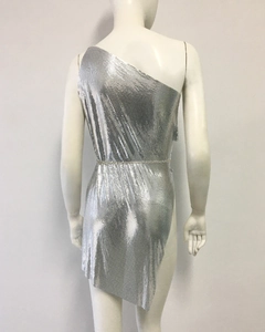 Detail of silver one-shoulder sequin dress with sparkling rhinestone belt decoration