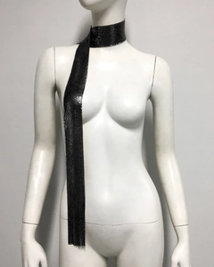 Detail of black metal mesh scarf texture on mannequin featuring high-quality weaving