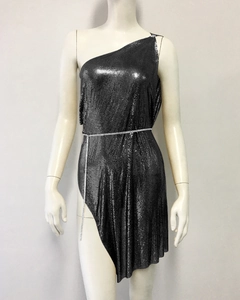 Detail view of black sequin mini dress with asymmetric hem and rhinestone waist chain