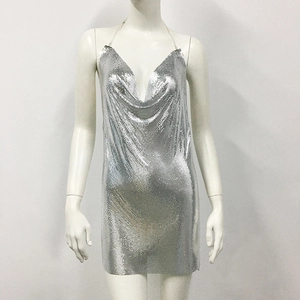 Detail of silver metallic mesh halter dress with deep V-neck for party and clubwear