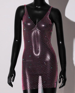 Detailed view of colorful rhinestones on a mesh fishnet party dress for women