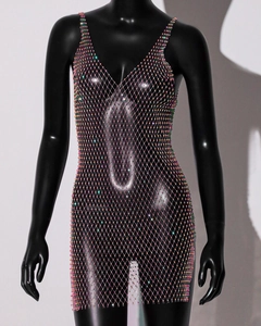Close-up of sparkling colorful rhinestones on mesh body chain dress for women