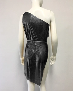 Detail of sequin mesh dress with rhinestone belt and asymmetrical backless cut