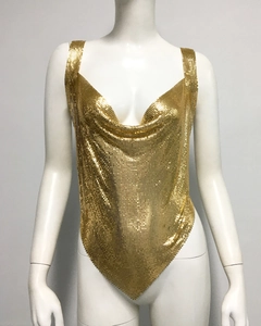 Detailed close-up of golden metallic sequin mesh fabric on a draped neck camisole top