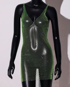 Detail of green fishnet mesh dress with sparkling rhinestones and delicate straps