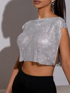 Sparkling silver rhinestone mesh crop top for women in a sleeveless party style