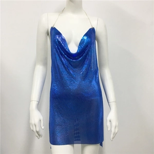 Detail of blue sequin mesh mini dress with silver chain halter and deep V-neckline