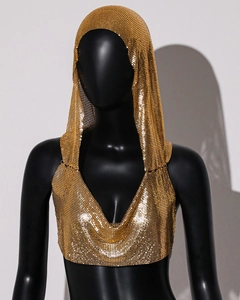 Detail of gold metal mesh sequin crop top and matching hooded scarf on a black mannequin