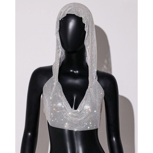 Detailed macro view of shimmering silver rhinestone metal mesh hooded vest body chain