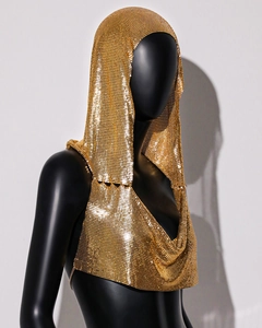 Detailed view of the gold metallic mesh fabric on a sexy hooded crop top for women