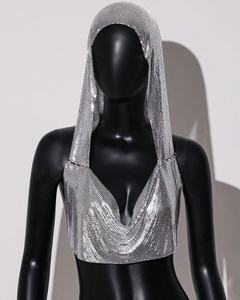 Close-up of shiny silver metallic sequin hooded halter top for party and club wear