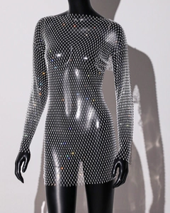 Close-up of sparkling rhinestones on mesh long sleeve bodycon dress for party wear