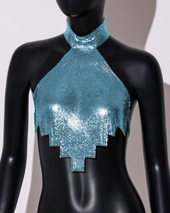 Detail view of shimmering blue metallic sequin halter top with mesh chainmail texture