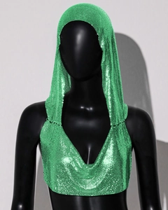Detail of bright green metallic mesh crop top with deep V-neck and hood for party wear