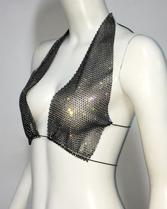 Detail view of black fishnet halter top with sparkling rhinestones for party wear
