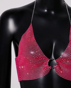 Detail of pink rhinestone halter top with silver chain and metal ring connector