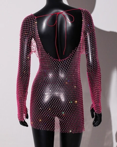 Detail of hot pink mesh dress with dense rhinestones and sexy backless tie-up design