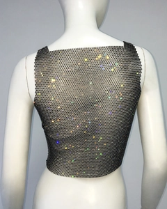 Close-up of black mesh crop top with colorful sparkling rhinestones and square neckline