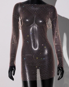 Detailed view of pink mesh mini dress featuring sparkly rhinestones and long sleeves