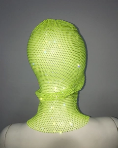 Detail of neon green fishnet balaclava mask with sparkling rhinestones and mesh texture