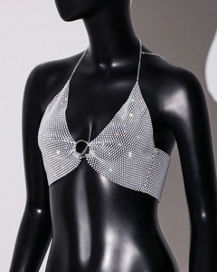 Detailed view of silver rhinestone mesh top with halter neck and metallic ring links
