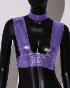 Close-up of purple metal sequin crop top with deep V-neck and matching choker accessory