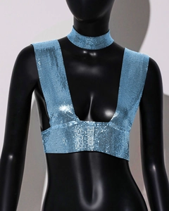 Close-up of light blue sequin mesh top with V-neck and matching neck collar detail